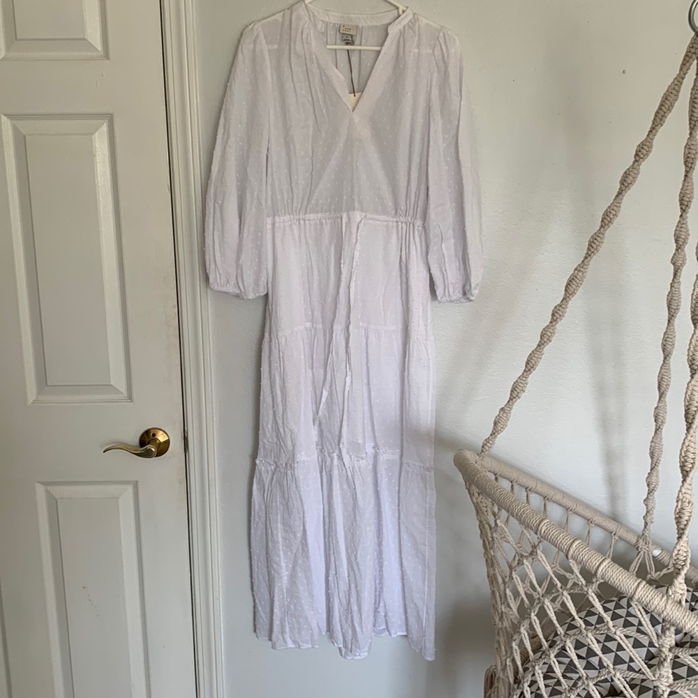 Slightly sheer white dress with tie waist